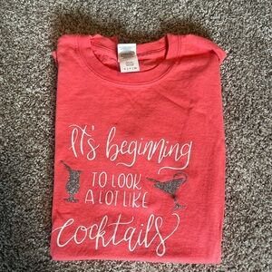 Women’s fun coral graphic Tee perfect for a night out with the girls!